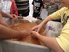 The Young Explorers archaeology group get a special close up view of the wahing process.