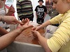 The Young Explorers archaeology group get a special close up view of the wahing process.